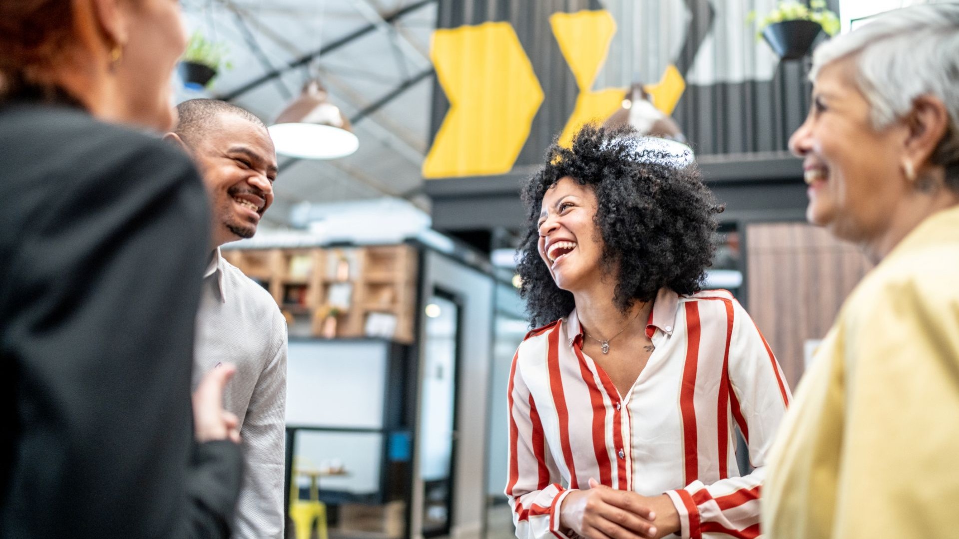 group of people talking at a networking event